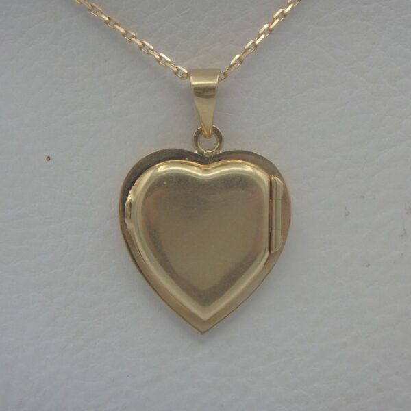 Pendentif Cassolette d'occasion en forme de cœur en or 18 karats