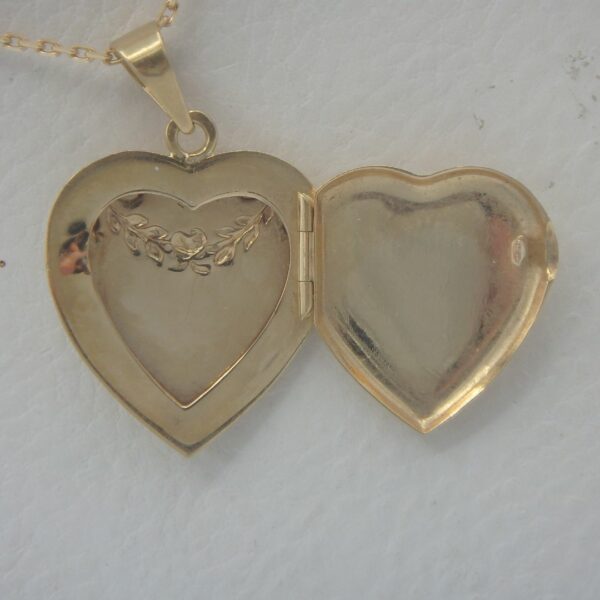 Pendentif Cassolette d'occasion en forme de cœur en or 18 karats